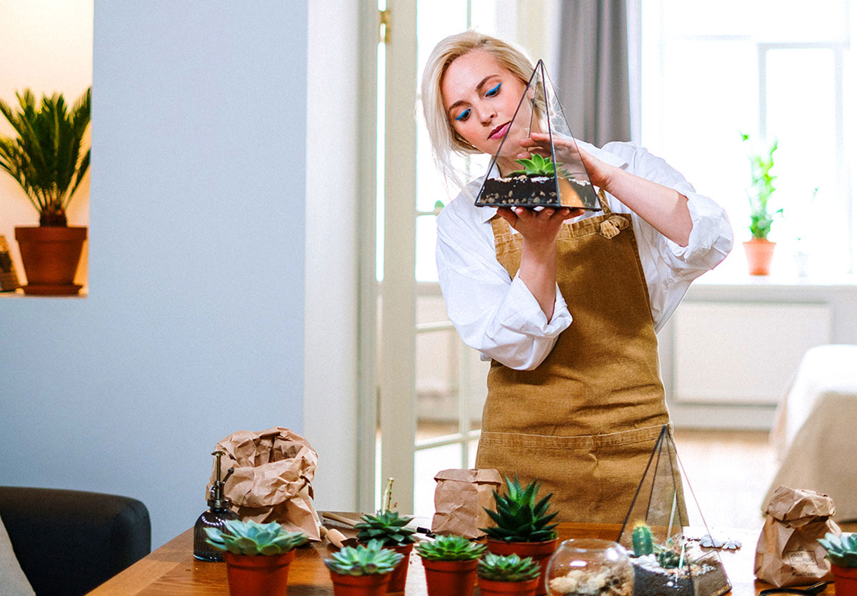 Woman making terrarium box-6